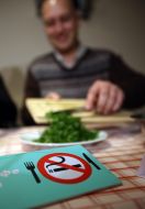 A notice warning of banning of smoking