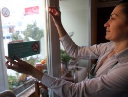 A notice warning of banning of smoking