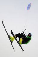 Skier riding a kite