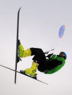 Skier riding a kite