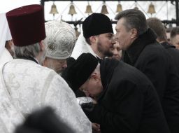 Viktor Yanukovich, Metropolitan Vladimir and Nikolay Azarov