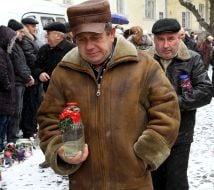 Men carry water containers