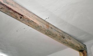 Crack in ceiling under the beam