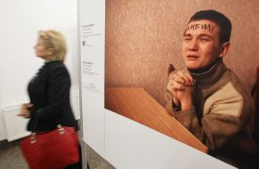 Woman of the exhibition "World Press Photo-2012"