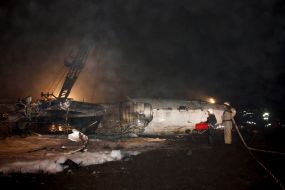 Rescue workers on the site of the crash