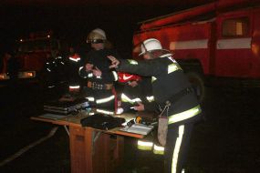 Rescue workers on the site of the crash
