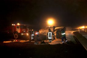 Rescue workers on the site of the crash