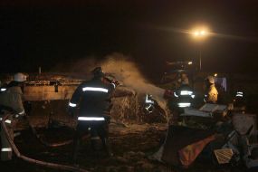 Rescue workers on the site of the crash