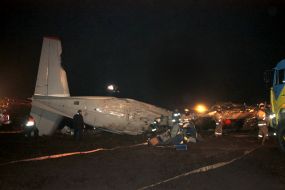 Rescue workers on the site of the crash
