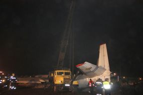 Rescue workers on the site of the crash