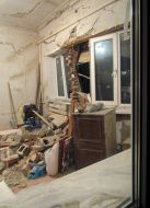 A tumbledown wall in a private house