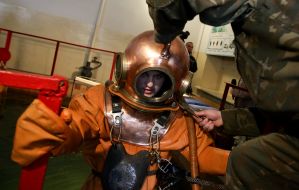 Soldier dives into the pool