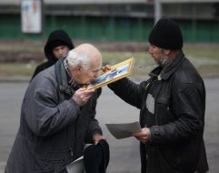 The believer kisses an icon