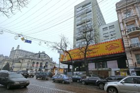 Advertising sign on the building that houses a pharmacy