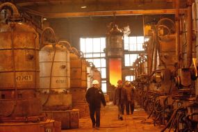 Workers at one of the workshops combine