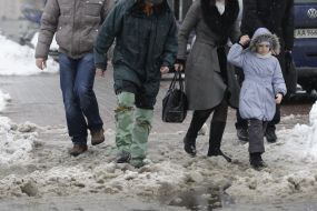 A man in rubber boots