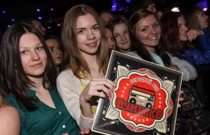 The girl holds a plate