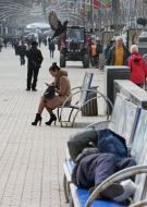 A woman with a child walking on the street