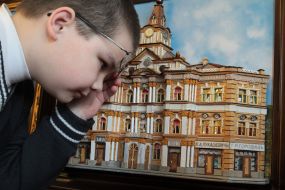 The boy sees a picture