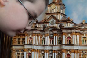 The boy sees a picture