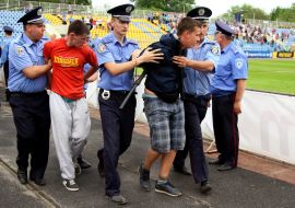 The police officers detained fan