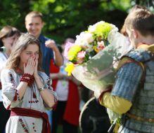 Man dressed as a knight declares his girlfriend