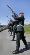 Soldiers carry fireworks