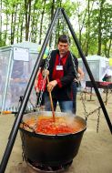 A man prepares goulash