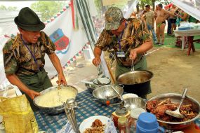 A man prepares goulash