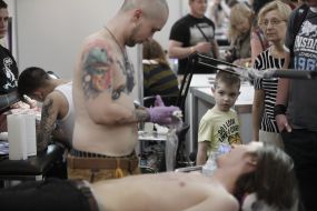 The tattoo artist at work