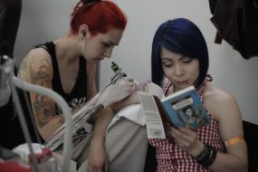 The tattoo artist at work