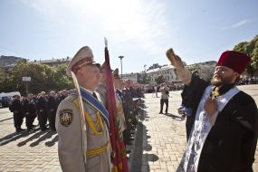 A priest conducts the rite of consecration