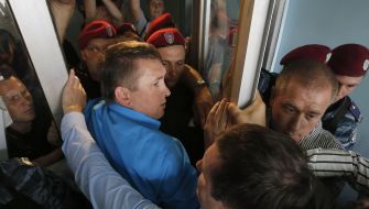 Mykola Melnichenko trying to get to court