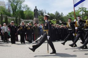 Participants of the ceremony of laying flowers