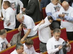 The deputies wearing shirts with a picture of Yulia Tymoshenko