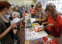 Visitors view the books