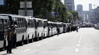 Buses with police officers