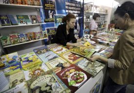 A girl examines books