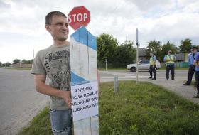 Participant of action near the border pillar