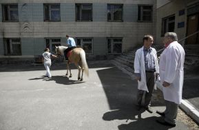 Children ride on horseback