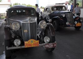 Cars of participants of rally  "Beijing-Paris 2013"
