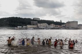 Young people sprinkle each other with flour