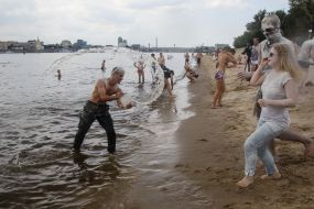 Young people sprinkle each other with flour