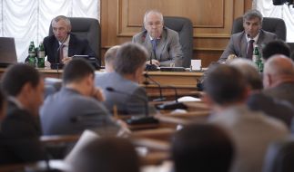 Igor Kaletnik, Vladimir Rybak and Ruslan Koshulinskiy