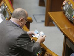 People's deputy holds cards for voting 