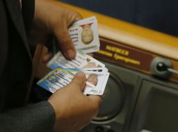 People's deputy holds cards for voting