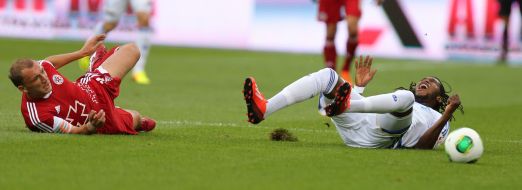 Demersi Mbokani and Sergey Siminin