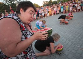 Woman eating watermelon