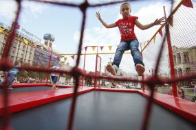 Girl jumping on a trampoline