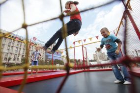 Children jumping on a trampoline